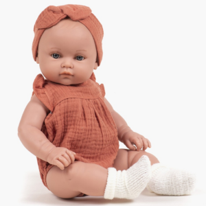 Yaëlle habillée de sa barboteuse Olivia & headband